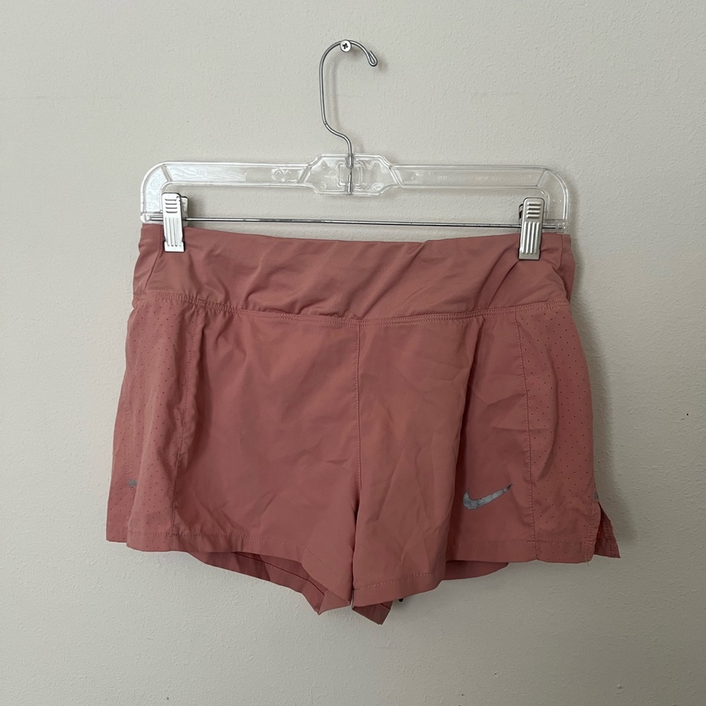 Women’s pink Nike running shorts